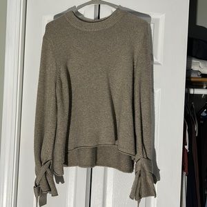 Brown sweater with sleeve ties. Really soft! Barely worn - like new.